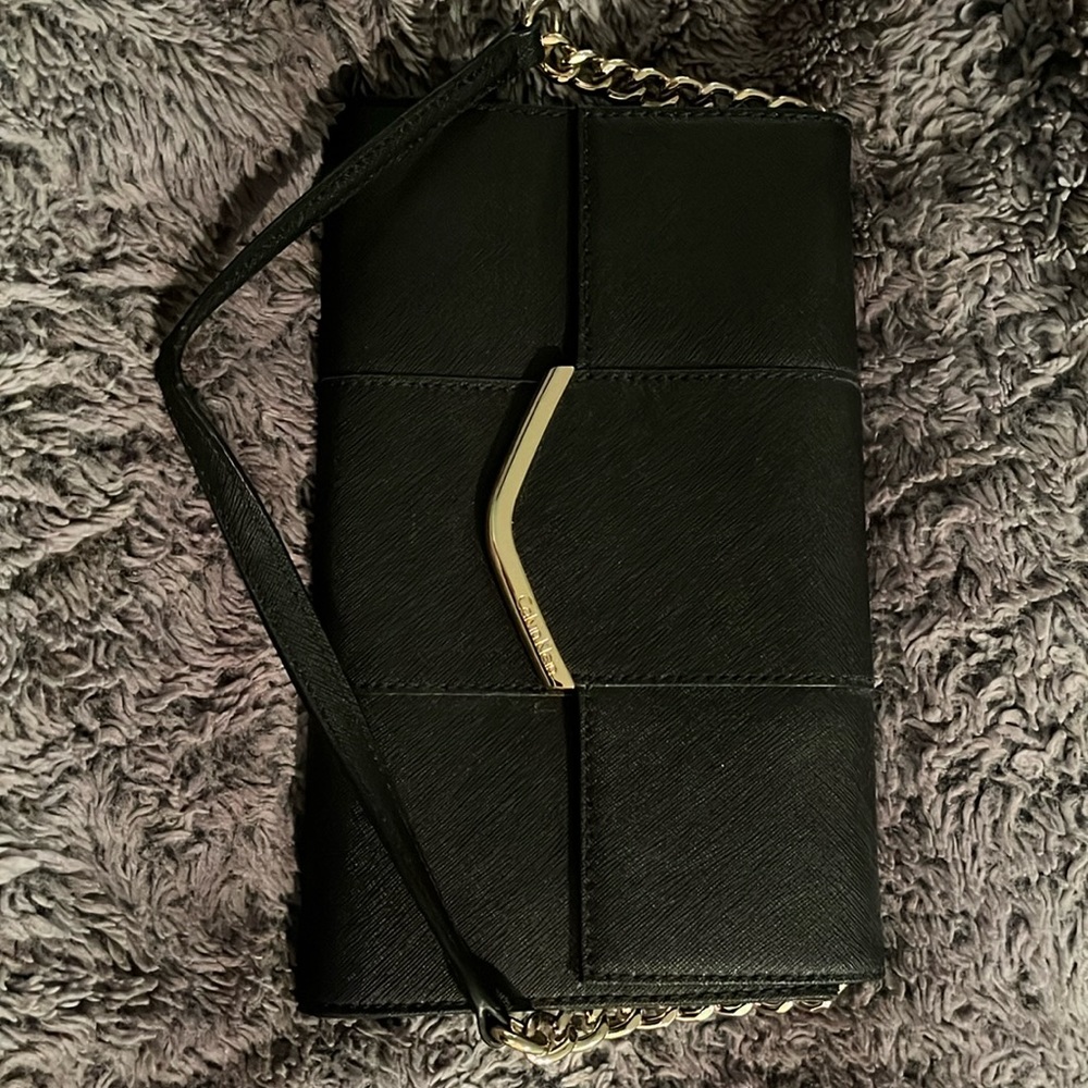 CK clutch handbag with gold hardware